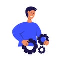 Man holds gears in his hand Royalty Free Stock Photo