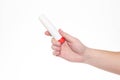 Man holds a glue stick in his hand on a white background, isolate. Close-up Royalty Free Stock Photo