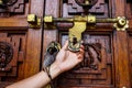 Man holds hand door handle or knocker Royalty Free Stock Photo