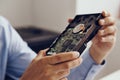 Man holds a hard drive, a computer, a fan, a microcircuit Royalty Free Stock Photo