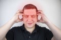 A man holds his head with his hands. Sensation of headache, migraine and dizziness. Headaches from stress or overwork