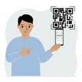 A man holds a mobile phone in his hand with the text scan me and scans the qr code, which is located nearby.