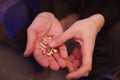 A man holds pills in his hands. Male hands hold many pills. Hands hold pink, white pills, medicine. Coronavirus tablets