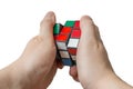 Man holds rubiks cube in hands. June 11th 2016, Czech Republic. Royalty Free Stock Photo