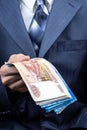 Businessman holding money hand Royalty Free Stock Photo