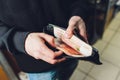 A man holds rubles and dollars in his hand, a businessman holds money in his hand. Royalty Free Stock Photo