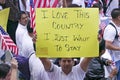 Man holds sign saying I love this country