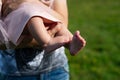 Man holds a small child in his arms, legs close up Royalty Free Stock Photo