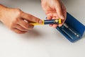 A man holds a syringe for subcutaneous injection of hormonal drugs in the IVF protocol in vitro fertilization Royalty Free Stock Photo