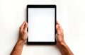 Man holds tablet device. Hands hold black modern tech product. Blank screen of tech display. Isolated white background. New tech
