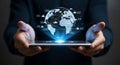 Man holds tablet displaying global network with shipping routes and data visualization Royalty Free Stock Photo