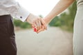 A man holds a woman`s hand. Hands of the bride and groom with a wedding ring close-up Royalty Free Stock Photo