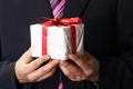 Man holiday a gift on his hand Royalty Free Stock Photo