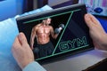 Man at home searching information in internet in gym website for