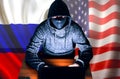 Man in hoodie is hacking personal data. Information security. Russian and American flags. Protection of information concept. Bad Royalty Free Stock Photo