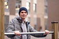 Man at a horizontal bar outdoors Royalty Free Stock Photo