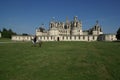 Man on a horse on the lawn near the castle of Chambord, Castles of the Loire, France