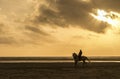 man horse riding on the beach Royalty Free Stock Photo