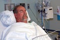 Man in hospital bed asleep