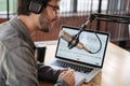 Man host broadcasting audio podcast in studio. Close up Royalty Free Stock Photo