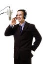 Man host at radio station speak to microphone