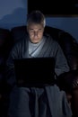 Man in housecoat working late series Royalty Free Stock Photo