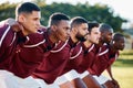 Man, huddle and team scrum for sports coordination, collaboration or serious on the grass field. Group of sport men in Royalty Free Stock Photo