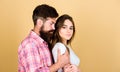 Man hug pretty woman. Bearded hipster cuddle with brunette girl. Feel his passion. Tender touch. Sensual couple in love Royalty Free Stock Photo