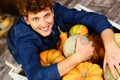 Man hugging pumpkins Royalty Free Stock Photo