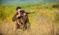 Man hunter aiming rifle nature background. Experience and practice lends success hunting. Guy hunting nature environment Royalty Free Stock Photo