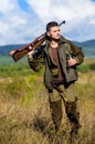 Man hunter carry rifle nature background. Experience and practice lends success hunting. Guy hunting nature environment Royalty Free Stock Photo