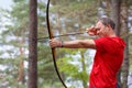 Man hunter shot with bow in open air Royalty Free Stock Photo