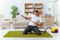 The man husband cleaning the house helping wife Royalty Free Stock Photo