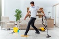 The man husband cleaning the house helping wife Royalty Free Stock Photo