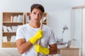 The man husband cleaning the house helping wife Royalty Free Stock Photo