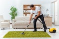 The man husband cleaning the house helping wife Royalty Free Stock Photo