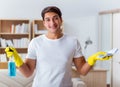 Man husband cleaning the house helping wife Royalty Free Stock Photo