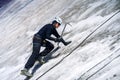 Man with ice ax on the glacier. Royalty Free Stock Photo