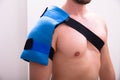 Man With A Ice Pack On His Shoulder