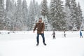 Man ice skating outdoors Royalty Free Stock Photo