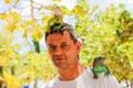 Man with iguana on his shoulder and head Royalty Free Stock Photo