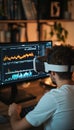 Man Immersed in Virtual Reality for Stock Market Data Analysis and Insight Exploration in Business Royalty Free Stock Photo