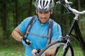 Man inflating bicycle tyre Royalty Free Stock Photo