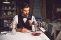 Man inhaling sort of wine Royalty Free Stock Photo