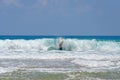 Man inside a big wave.