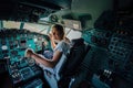 Man inside old abandoned disused passenger airplane Royalty Free Stock Photo