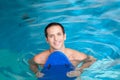 Man inside the pool with floater Royalty Free Stock Photo