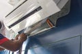 Man  install  Air Conditioner Unit Royalty Free Stock Photo