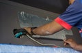 Man  install  Air Conditioner Unit Royalty Free Stock Photo