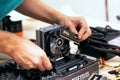 man installing Fury Beast RAM DDR4 stick on professional PC. Russia, 17.08.2021
